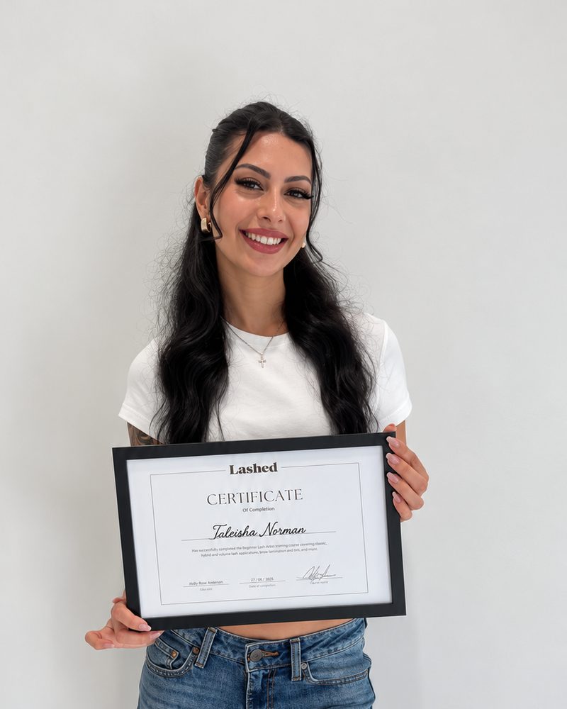 Taleisha, LBHR graduate, with her certificate of completion