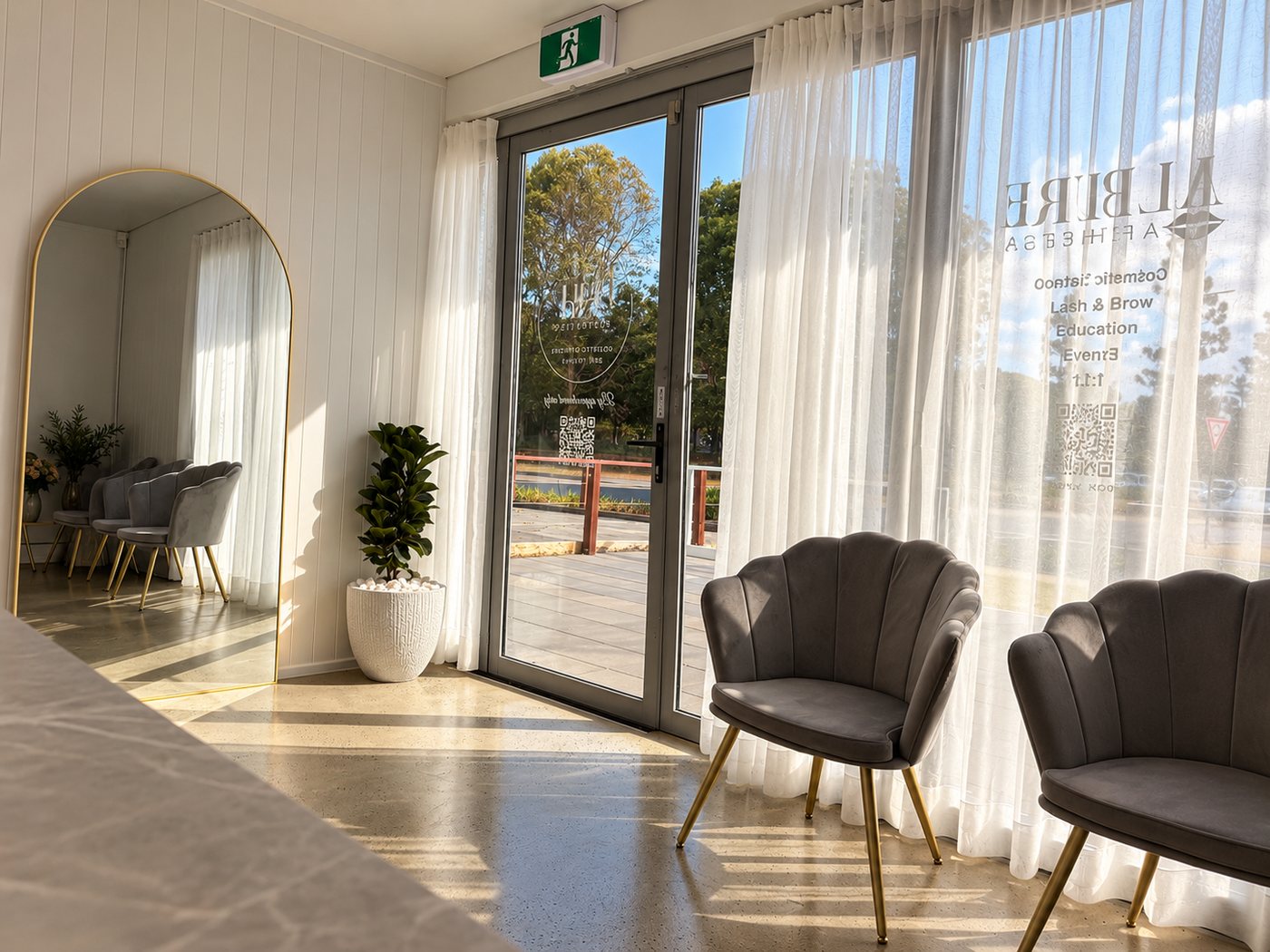 Sunlit waiting area at the studio entrance